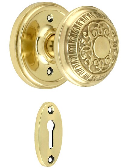 Classic Rosette Mortise Lock Set With Egg And Dart Door Knobs in Polished Brass finish.